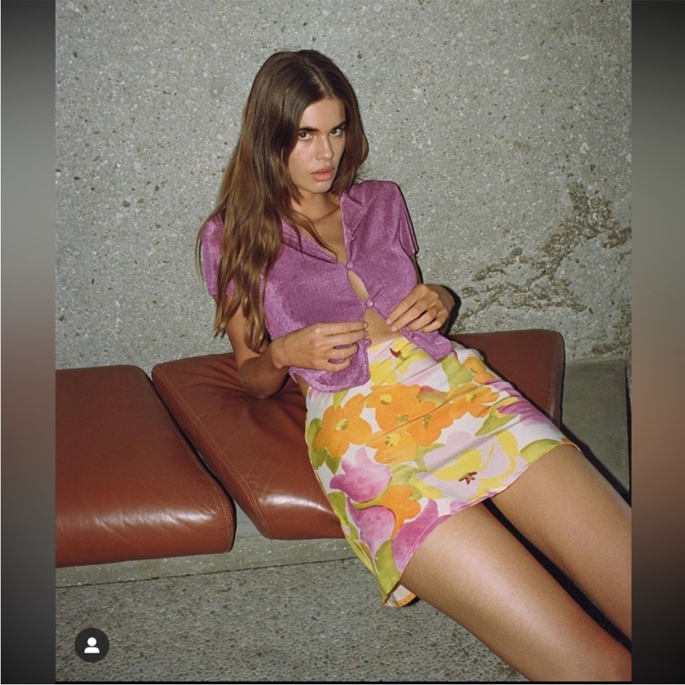 With Jean Tess fuchsia top